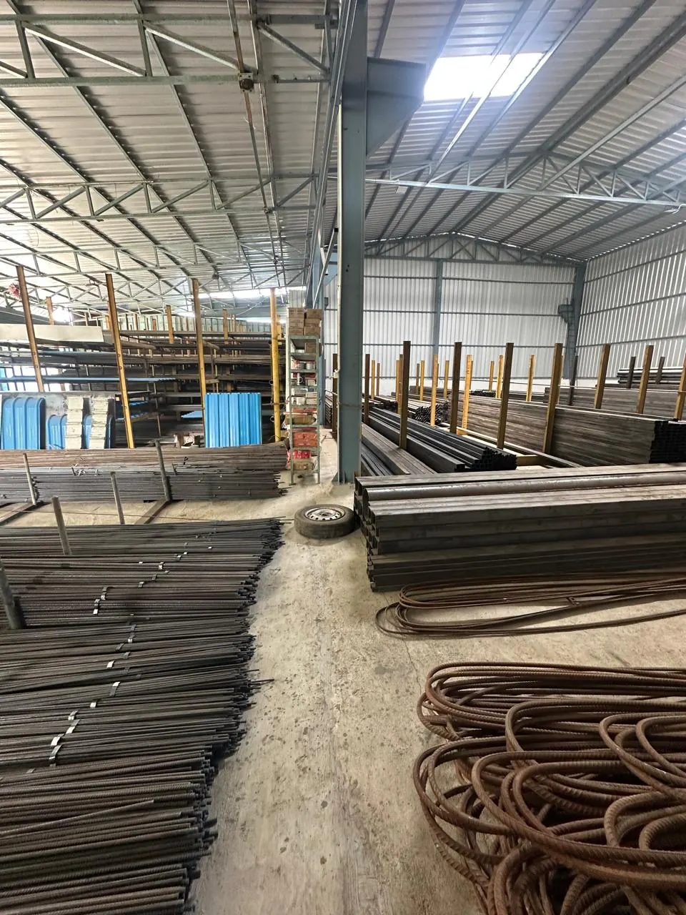 Mild steel sections racked at the SV Steels Chennai warehouse